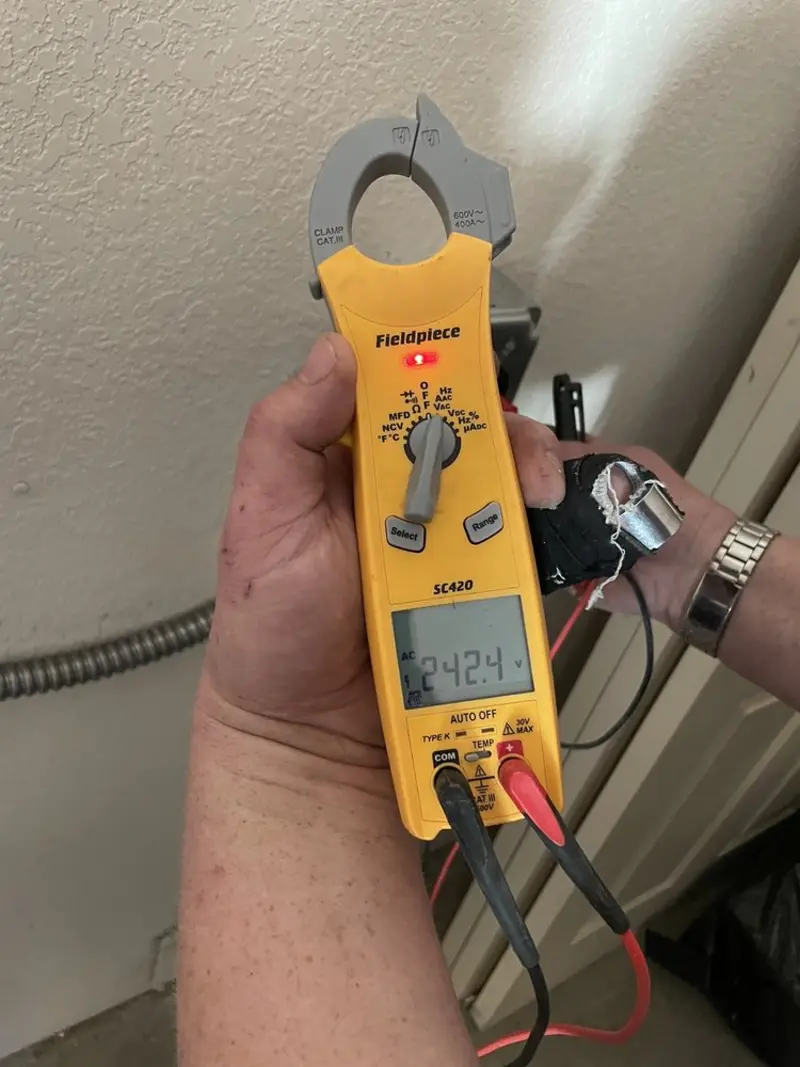 Voltage testing with clamp meter during Circuit Breaker Repair in Rexburg